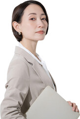 パソコンを持つスーツの真剣な表情のカメラ目線の女性　営業や、キャリアウーマン　背景透明の上半身