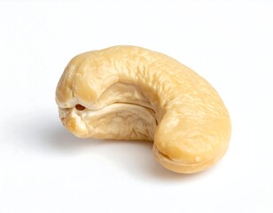 Close-up studio shot of a raw, shelled nut on a clean white backdrop