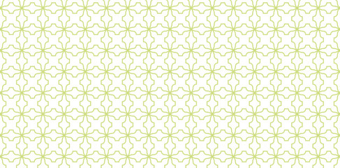 Seamless pattern background texture in geometric ornamental style green colors isolated white backgrounds for fabric, textile, cover, wrapping papers