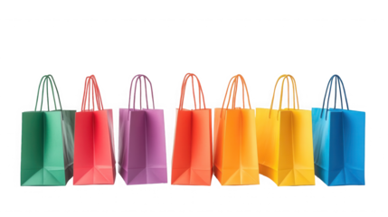 Colorful shopping bags arranged in a row against a black studio background view on transparent background