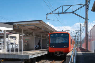 Orange Iyotetsu Train at Mitsu Station, Matsuyama, Ehime Prefecture, Shikoku, Japan