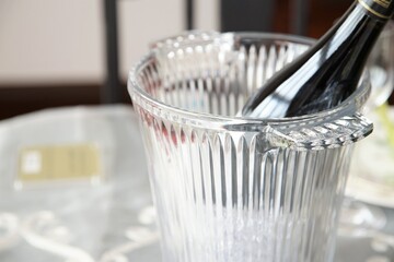 A wine bottle in a wine cooler