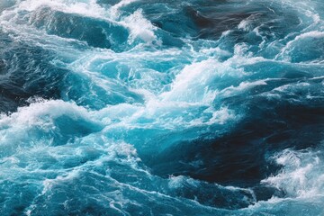 Rippling waves of river water create a mesmerizing abstract pattern reflecting shades of blue and white under natural light, showcasing the beauty of flowing water