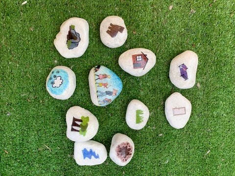 Story stones rocks Dear Zoo on grass
