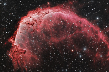 A telescope view of the Crescent Nebula with its intricate details  
