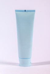 Blank white plastic tube mockup for beauty products, cream, or toothpaste. Isolated on a white background, perfect for branding presentations
