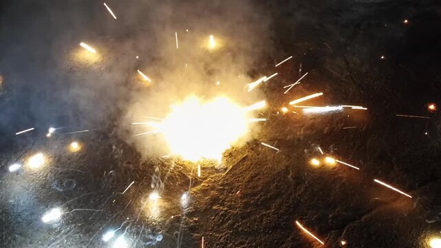 Diwali night celebration with colorful fireworks lighting up the sky. Festive atmosphere symbolizing Indian cultural traditions during the Festival of Lights. Perfect for use in holiday and festival