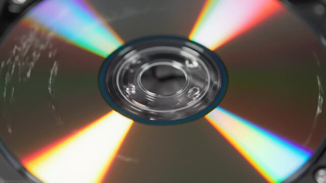 Rotating Compact Disc Showing Light Refraction, Close Up