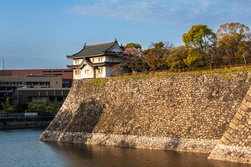 Historic Japanese Castle and Stone Historic Castle and Stone Walls by the Water in Japan