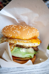 Delicious Hamburger with Egg and Fresh Lettuce