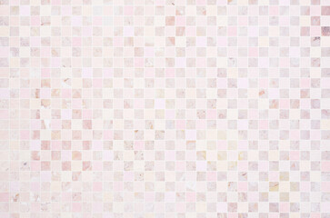Soft pastel pink and peach tone gradient geometric grid pattern background. Minimal abstract square pattern with washi paper texture.