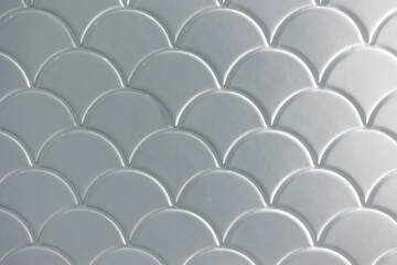 Obraz premium White tile in fish scale, cloud, wave style in toilet wall texture pattern light shade background