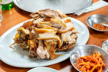 Delicious Korean Pork Dish with Side Dishes