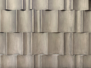 Close up of molded curved decorative grey tiles. Suitable for roofing, wall panel, and...