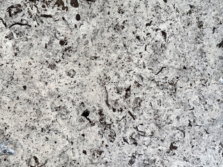 Natural grey marble with random abstract texture. Luxurious rare type of grey natural marble stone with dark black veins, Seamless background texture.