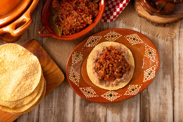 Ground beef tinga, a traditional Mexican home-cooked dish consisting primarily of beef cooked with chipotle chili and lots of onion, is traditionally eaten on 