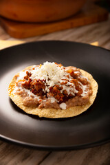 Ground beef tinga, a traditional Mexican home-cooked dish consisting primarily of beef cooked with chipotle chili and lots of onion, is traditionally eaten on 