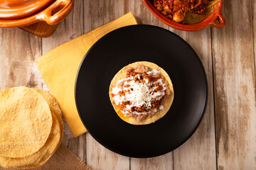 Ground beef tinga, a traditional Mexican home-cooked dish consisting primarily of beef cooked with chipotle chili and lots of onion, is traditionally eaten on 