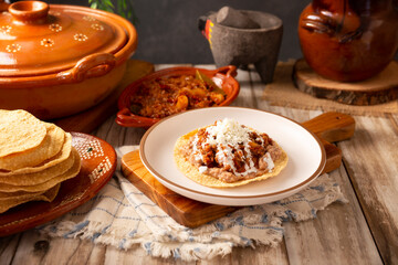 Ground beef tinga, a traditional Mexican home-cooked dish consisting primarily of beef cooked with chipotle chili and lots of onion, is traditionally eaten on 