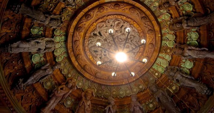 Intricate wooden architecture on the ceiling of Sanctuary of Truth temple in Pattaya city, Thailand.