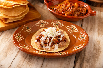 Ground beef tinga, a traditional Mexican home-cooked dish consisting primarily of beef cooked with chipotle chili and lots of onion, is traditionally eaten on 