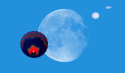 Hot air balloon fly in the sky - Jupiter-Saturn Convergence That Happens Every 20 Years, full moon in the foreground "Elements of this image furnished by NASA" © muratart