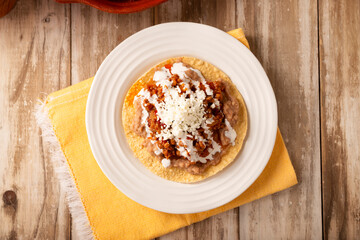 Ground beef tinga, a traditional Mexican home-cooked dish consisting primarily of beef cooked with chipotle chili and lots of onion, is traditionally eaten on 