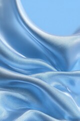 Obraz premium Light blue silk fabric drapes in soft waves