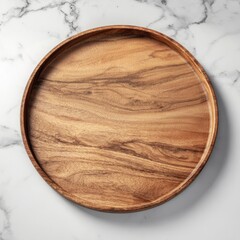 Round wooden platter on marble