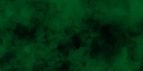 Green steam on a black background. Green Fog Blaster. Green smoke texture on black background. Grunge colorful distressed texture background wallpaper .   © Tafseer