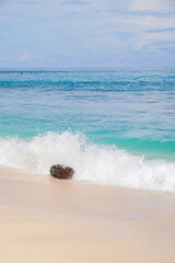 Waves crashing on the beach. Turquoise tropical beach landscape at Labuhan Jukung Beach, Krui, Lampung.