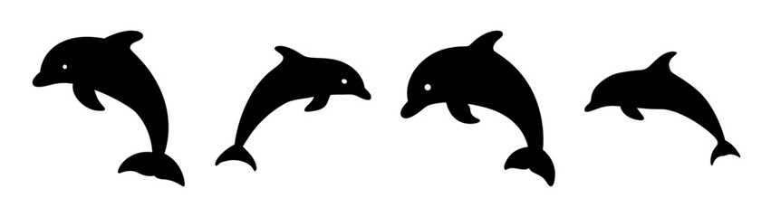 Obraz premium Four dynamic black silhouettes of dolphins leaping joyfully out of water