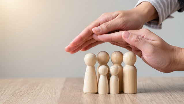 Protecting Hands Over wooden Family, Family Protection And Care Concept, family home, foster care, homeless charity support concept, family mental health