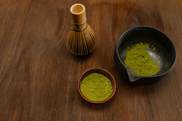 Japanese ceremony . Green powder tea matcha , healthy drink. Rustic background