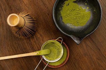 Japanese ceremony . Green powder tea matcha , healthy drink. Rustic background