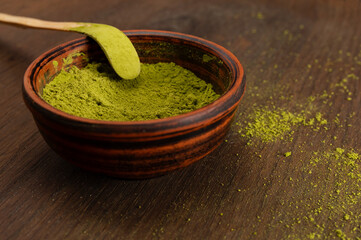 Japanese ceremony . Green powder tea matcha , healthy drink. Rustic background