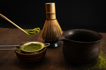 Japanese ceremony . Green powder tea matcha , healthy drink. Rustic background