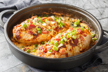 Cheesy Creamy Million Dollar Chicken Casserole with crispy bacon and almonds closeup on the pan on the table. Horizontal