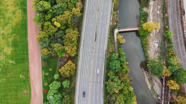 Beautiful drone view of the Don Valley Parkway, Riverdale Park and the Don River in autumn in Toronto, Ontario, Canada. 