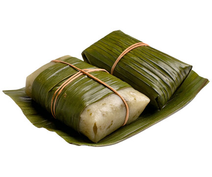 Steamed kuih lepat pisang banana cake dumplings wrapped in fresh banana leaves