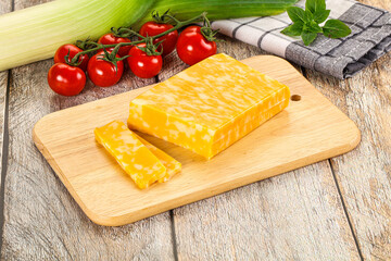 Marble yellow cheese with slices