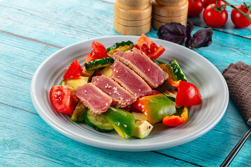 Salad with tuna tataki and avocado