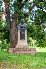 Obraz premium Statue to Czech female author Karolina Svetla in Charles Square (Czech: Karlovo namesti) a city square with a park in the New Town of Prague, Prague, Czechia