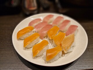 Japanese sushi is a dish consisting of vinegared rice called shari and various side dishes such as raw fish