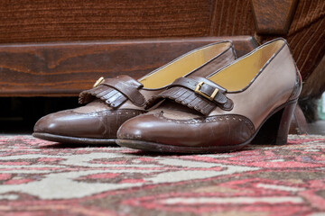 Vintage classic women shoes on floor