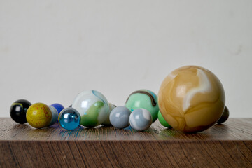 Marble game on wooden support