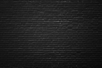 Fototapeta premium Rough black brick wall texture or background 