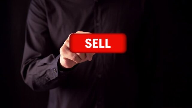 A man are pushing sell button for order something 