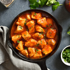 Sweet and spicy chicken breast with sauce, top view