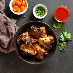 Grilled chicken wings in bowl